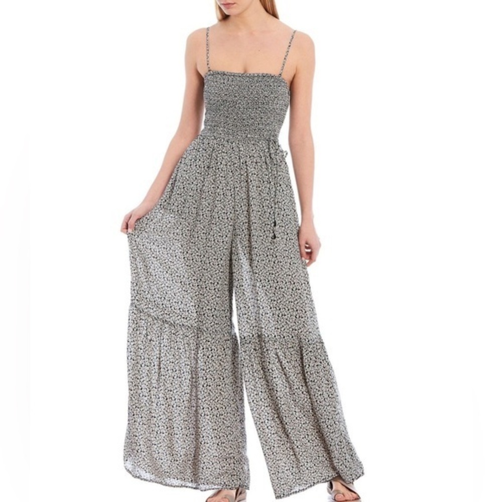 NWT  Free peopleBlack and White floral jumpsuit medium! Can be worn strapless.